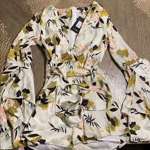 Floral Romper  Brand New Size Medium
